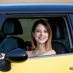 young girl in car